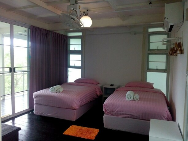 Imagen de la habitación del Hotel Frontier Homestel. Foto 21