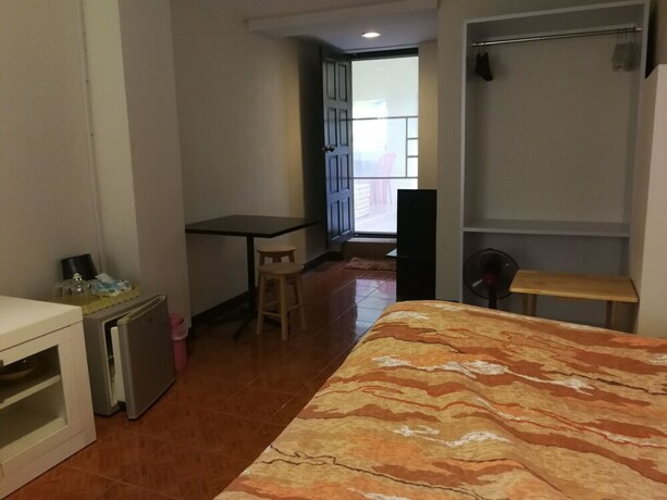 Imagen de la habitación del Hotel Frontier Homestel. Foto 29