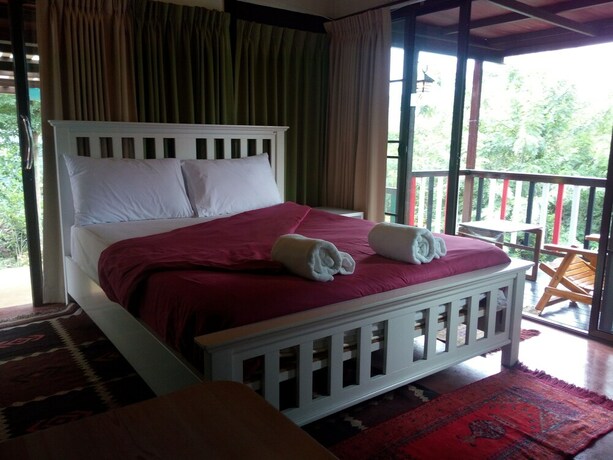 Imagen de la habitación del Hotel Frontier Homestel. Foto 33