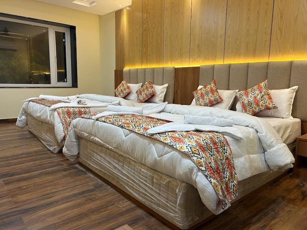 Imagen de la habitación del Hotel Frosty Fern and Resort. Foto 6