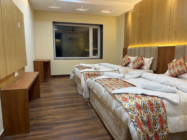 Imagen de la habitación del Hotel Frosty Fern and Resort. Foto 11