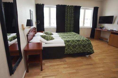 Imagen de la habitación del Hotel Fru Haugans. Foto 6