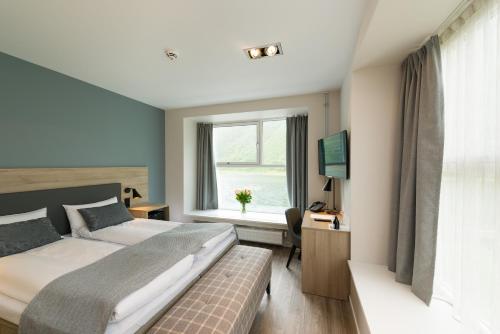 Imagen de la habitación del Hotel Fru Haugans. Foto 9