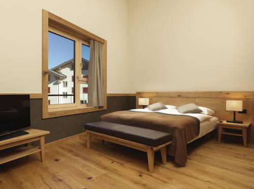 Imagen de la habitación del Hotel Frutt Family Lodge. Foto 8