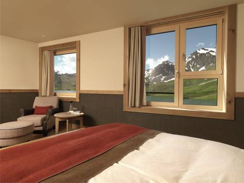 Imagen de la habitación del Hotel Frutt Family Lodge. Foto 10