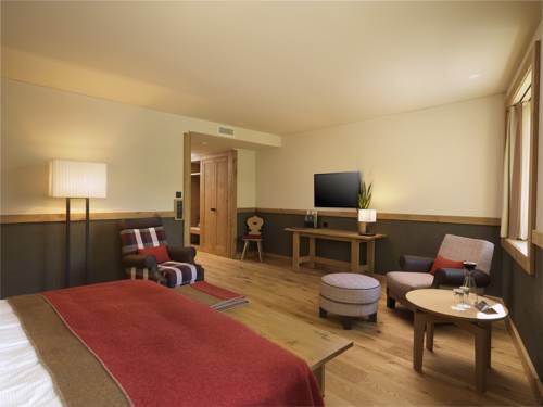 Imagen de la habitación del Hotel Frutt Family Lodge. Foto 13