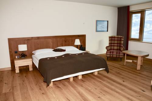 Imagen de la habitación del Hotel Frutt Mountain Resort. Foto 10