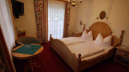 Imagen de la habitación del Hotel Fr&uuml;hst&uuml;ckspension Huber. Foto 6