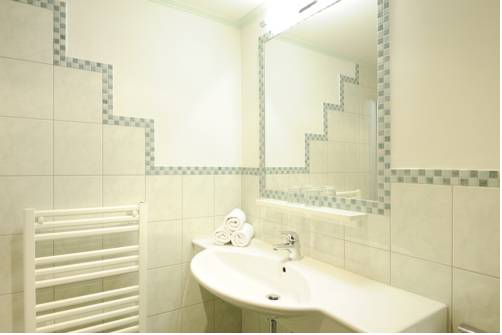 Imagen de la habitación del Hotel Fr&uuml;hst&uuml;ckspension Huber. Foto 8