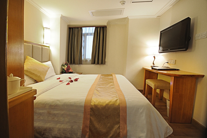 Imagen de la habitación del Hotel Fu Hua. Foto 6