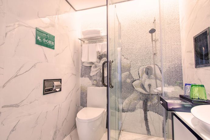 Imagen de la habitación del Hotel Fu Qian Ming Tai Serviced Apartment. Foto 2