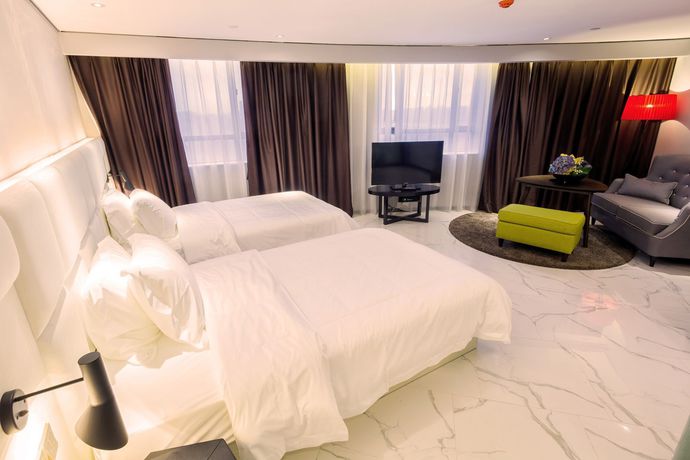 Imagen de la habitación del Hotel Fu Qian Ming Tai Serviced Apartment. Foto 3
