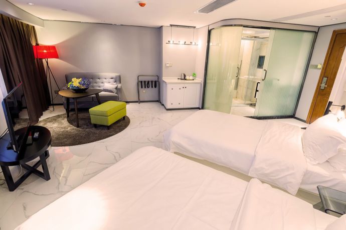 Imagen de la habitación del Hotel Fu Qian Ming Tai Serviced Apartment. Foto 4
