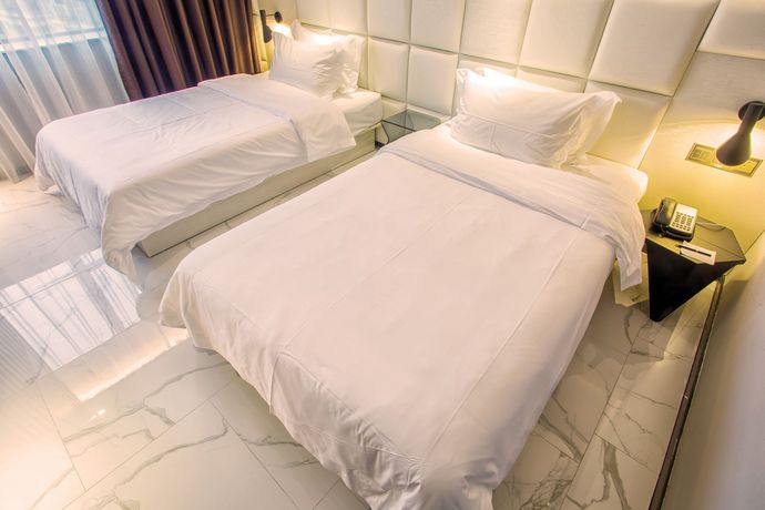 Imagen de la habitación del Hotel Fu Qian Ming Tai Serviced Apartment. Foto 9