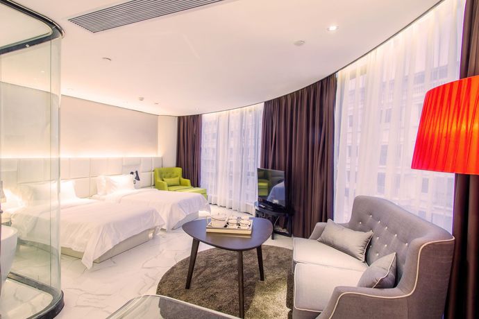Imagen de la habitación del Hotel Fu Qian Ming Tai Serviced Apartment. Foto 10