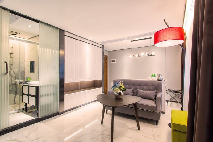 Imagen de la habitación del Hotel Fu Qian Ming Tai Serviced Apartment. Foto 11
