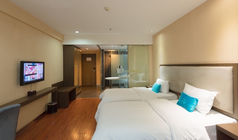 Imagen de la habitación del Hotel Fu Yi Fashion. Foto 3