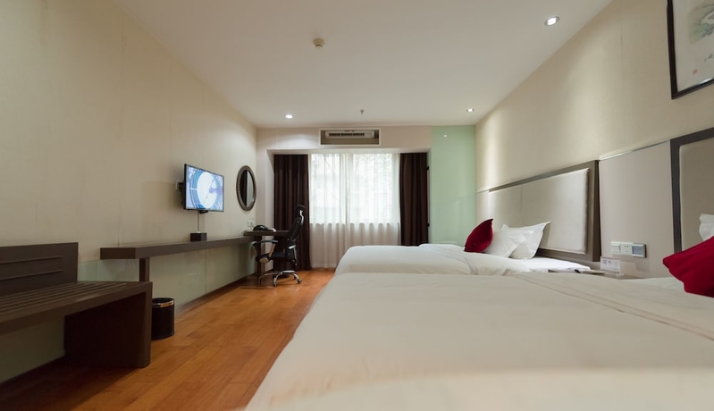 Imagen de la habitación del Hotel Fu Yi Fashion. Foto 12