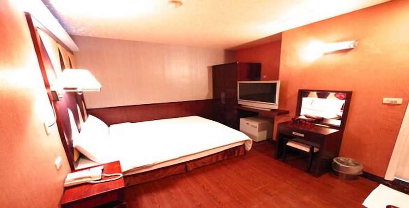 Imagen de la habitación del Hotel Fuchia. Foto 12