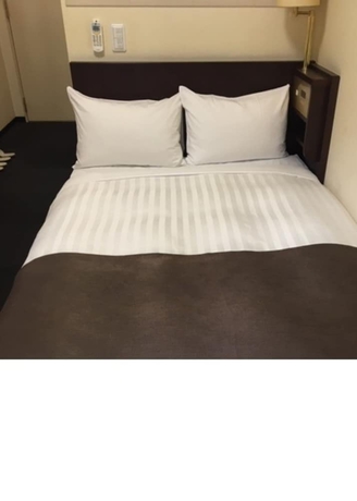 Imagen de la habitación del Hotel Fuchu Urban Annex. Foto 9