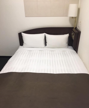 Imagen de la habitación del Hotel Fuchu Urban Annex. Foto 12
