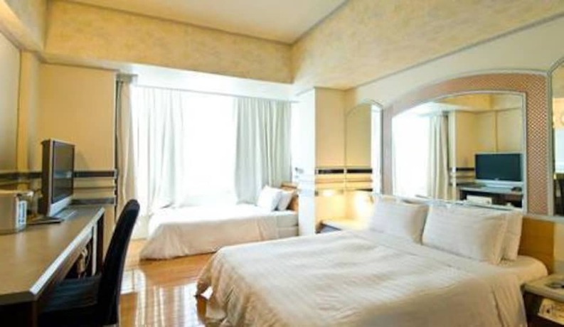 Imagen de la habitación del Hotel Fudi hotel. Foto 2