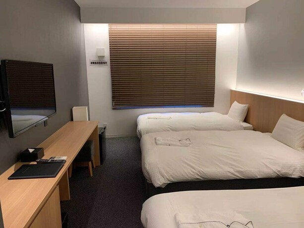 Imagen de la habitación del Hotel Fugastay Shijo Omiya. Foto 15