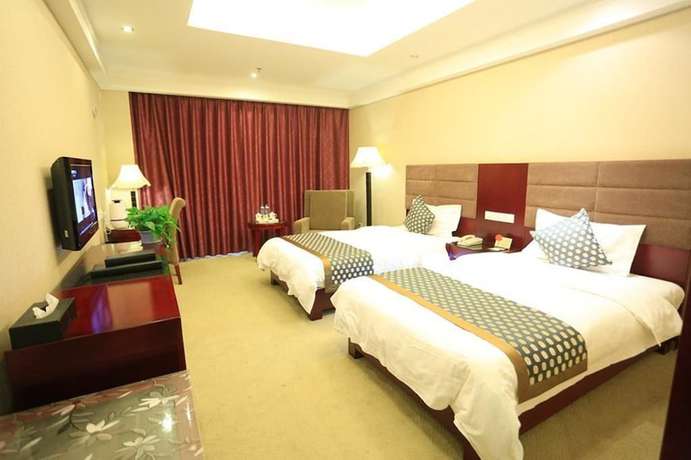 Imagen de la habitación del Hotel Fuguo Hotel - Dunhuang. Foto 4