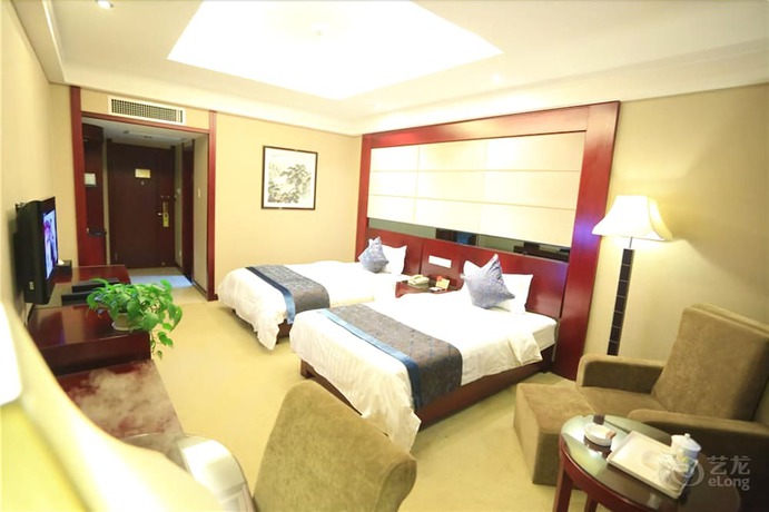 Imagen de la habitación del Hotel Fuguo Hotel - Dunhuang. Foto 7