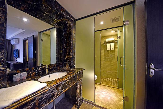 Imagen de la habitación del Hotel Fuhao. Foto 10