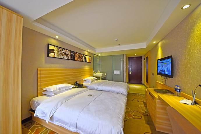 Imagen de la habitación del Hotel Fuhao. Foto 12