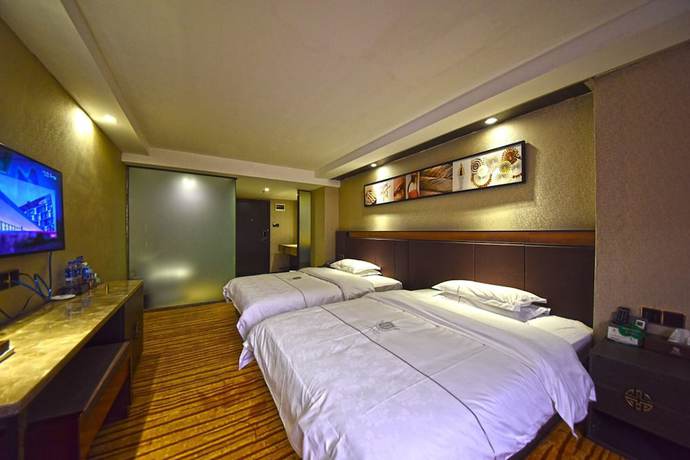 Imagen de la habitación del Hotel Fuhao. Foto 14