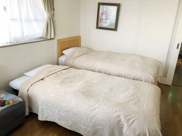 Imagen de la habitación del Hotel Fuji Gotenba Condominium Tannpopo. Foto 21
