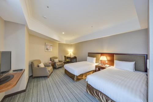 Imagen de la habitación del Hotel Fuji Grand. Foto 3