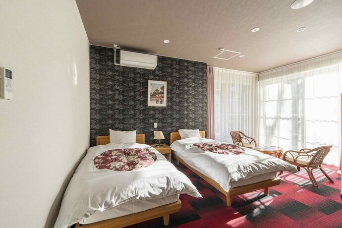 Imagen de la habitación del Hotel Fuji Shoei Kaikan. Foto 20