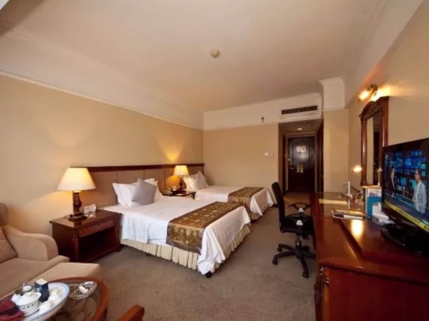 Imagen de la habitación del Hotel Fujian Sunshine Holiday. Foto 5