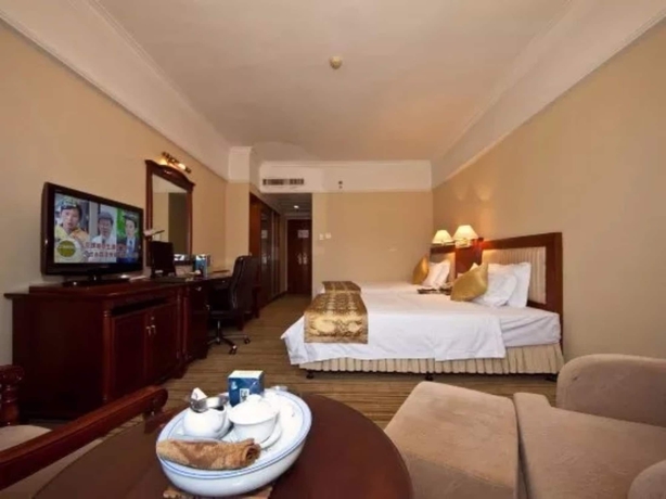 Imagen de la habitación del Hotel Fujian Sunshine Holiday. Foto 6