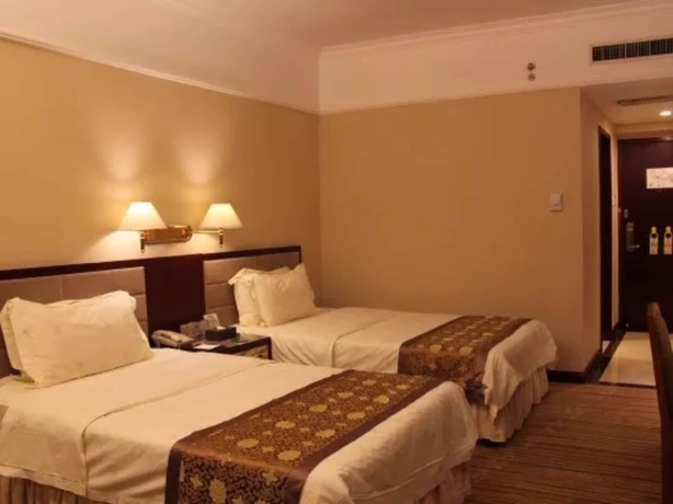Imagen de la habitación del Hotel Fujian Sunshine Holiday. Foto 9