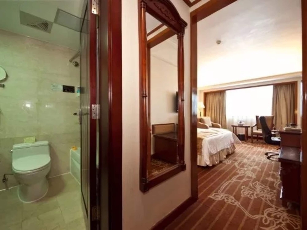 Imagen de la habitación del Hotel Fujian Sunshine Holiday. Foto 11