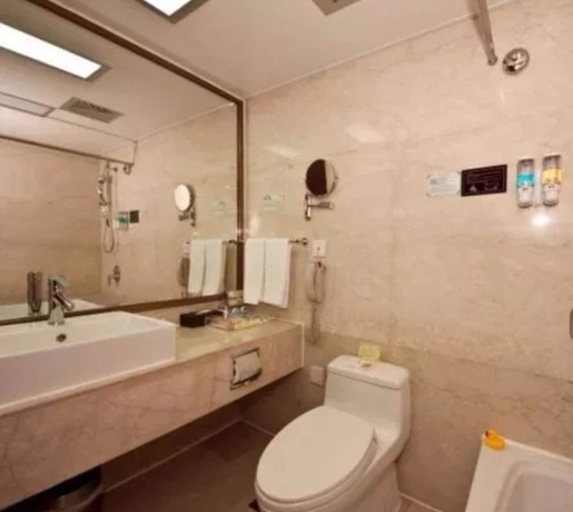 Imagen de la habitación del Hotel Fujian Sunshine Holiday. Foto 14