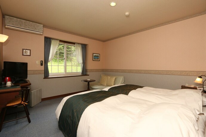 Imagen de la habitación del Hotel Fujikawaguchiko Crescendo. Foto 16