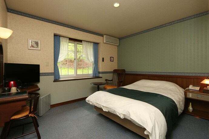 Imagen de la habitación del Hotel Fujikawaguchiko Crescendo. Foto 33