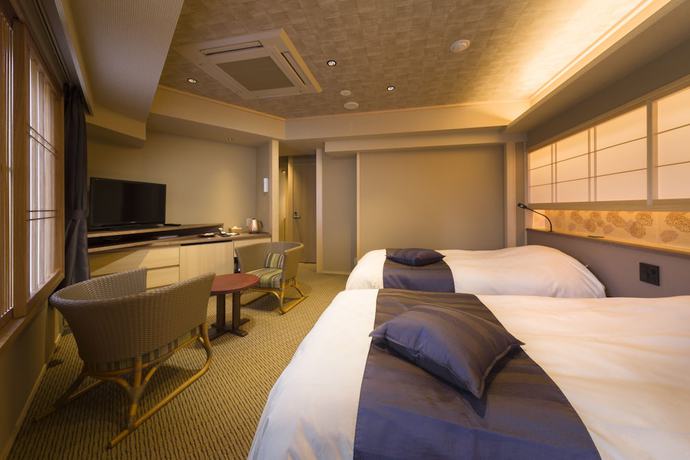 Imagen de la habitación del Hotel Fujisan Onsen Kaneyamaen. Foto 5