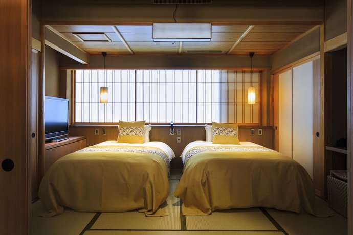 Imagen de la habitación del Hotel Fujisan Onsen Kaneyamaen. Foto 12