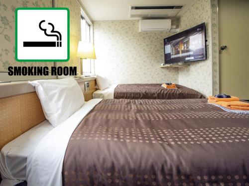 Imagen de la habitación del Hotel Fujiyoshi. Foto 18