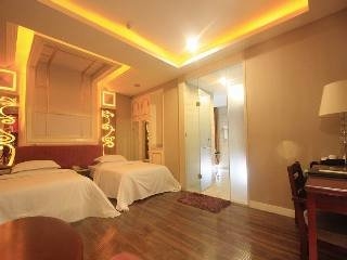 Imagen de la habitación del Hotel Fulai Garden Hotel. Foto 11