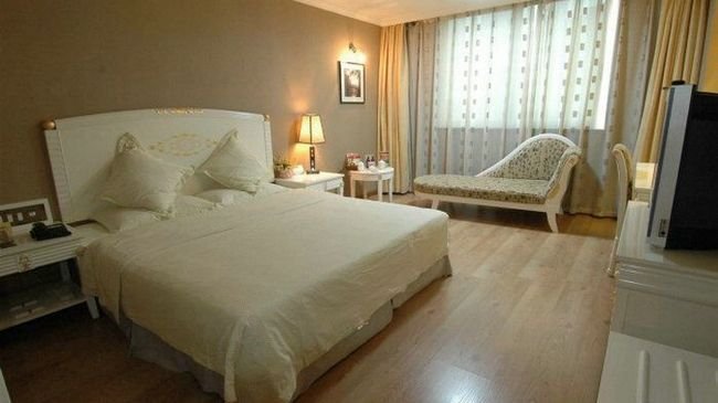 Imagen de la habitación del Hotel Fuli. Foto 2