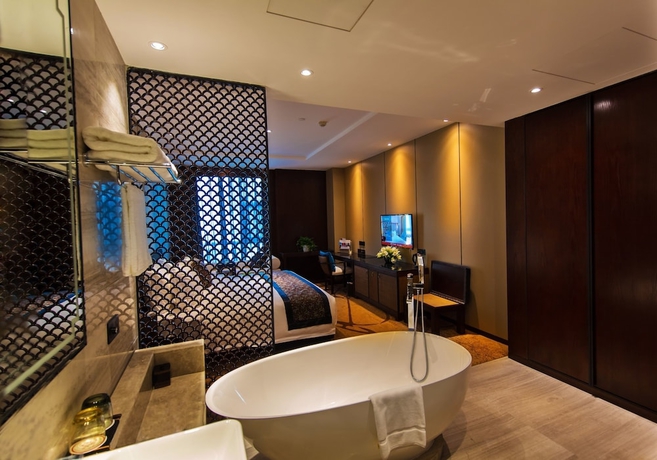 Imagen de la habitación del Hotel Fulitai International Yantai. Foto 2
