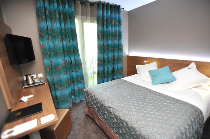 Imagen de la habitación del Hotel Full Colors. Foto 6