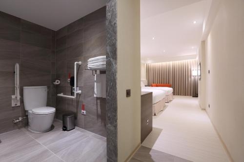 Imagen de la habitación del Hotel Full Kind. Foto 10